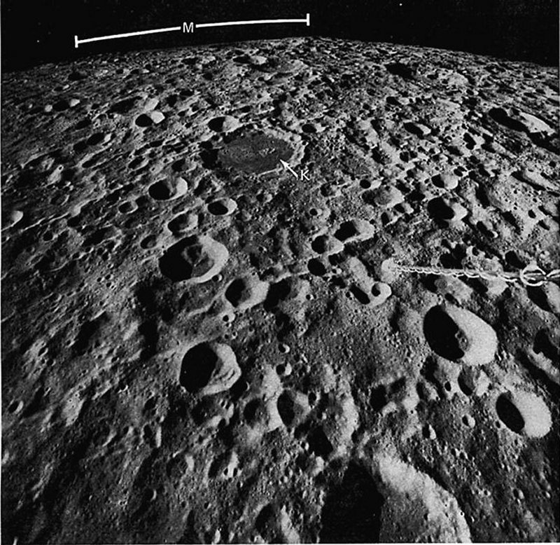 FIGURE 19 . An oblique view of an area near the center of the far side taken with the Apollo 16 mapping camera from orbit at an altitude of 166 km.