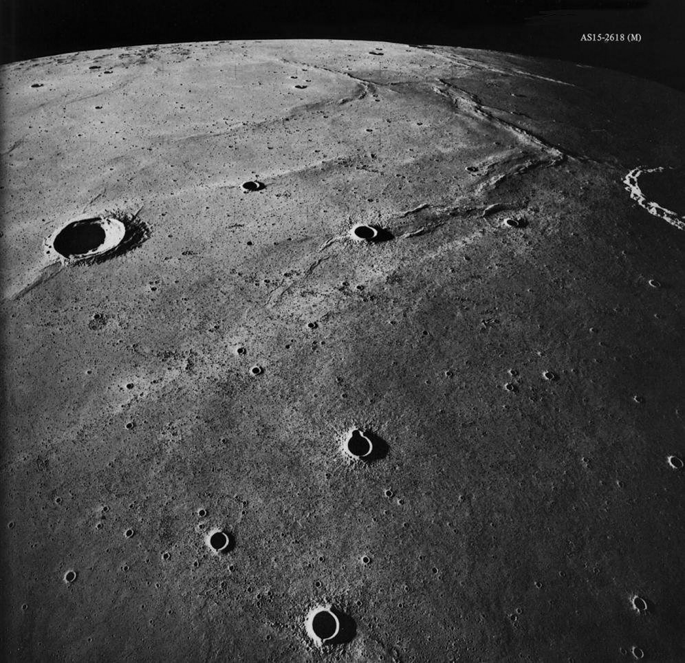 Figure 31. - During the various Apollo missions, the west limb of the Moon was in shadow behind the terminator and could not be photographed. AS15-2618 (M)