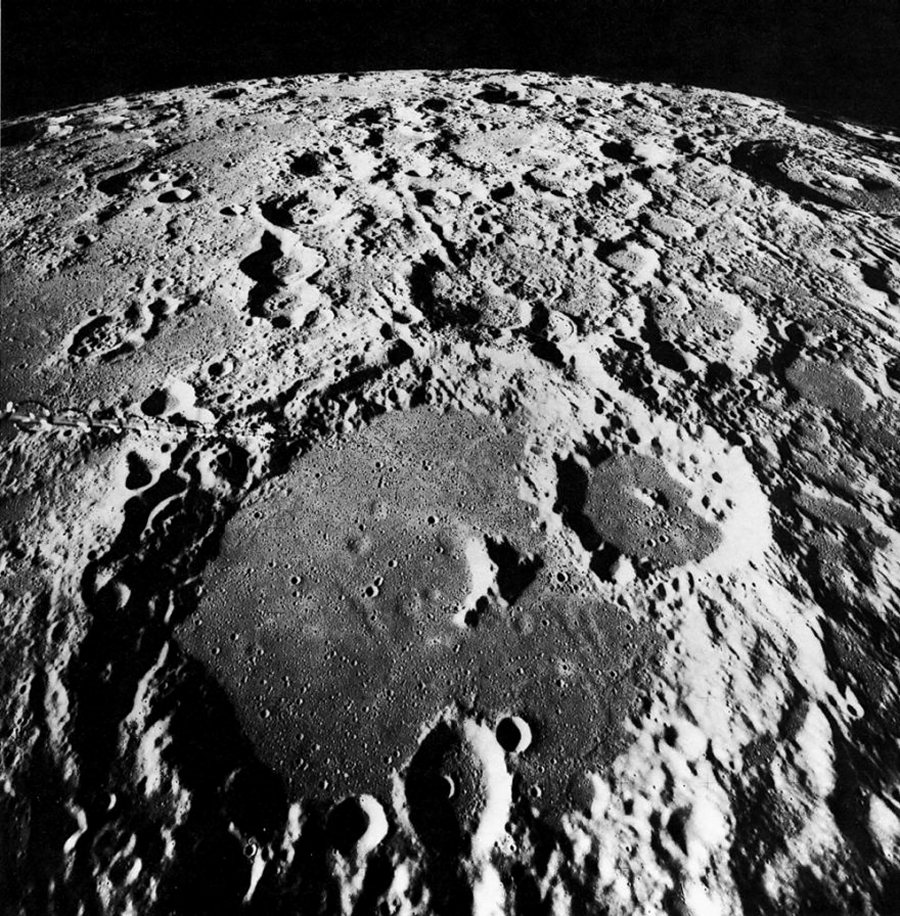FIGURE 53. - Light plains are a conspicuous feature of several lunar terra regions including the central near side highlands.
