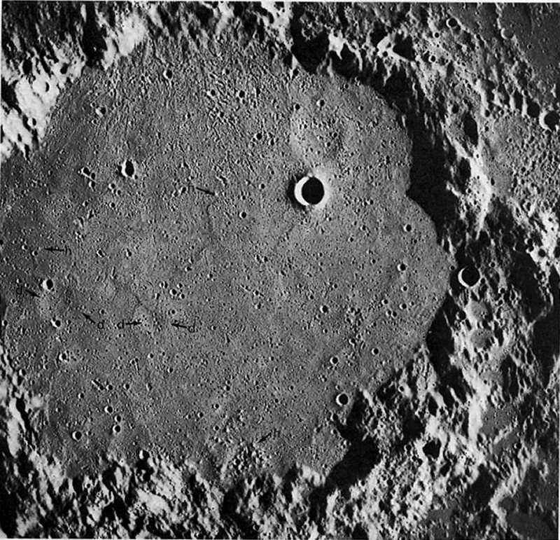 FIGURE 54. - This picture shows the subdued, 1 50 km diameter, crater Ptolemaeus. The crater is filled to about half its original depth by the Cayley Formation, a unit with a gently undulating, nearly smooth surface.